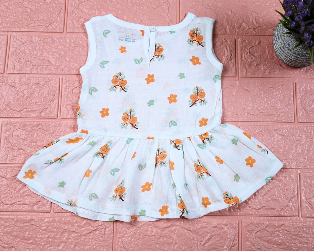 Citrus Bloom Baby sleeveless frock in white with button, printed with orange floral patterns