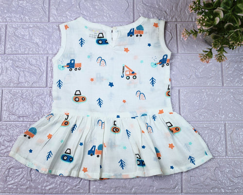 Crane Crew baby sleeveless frock in white with button, printed with construction equipment vehicle pattern