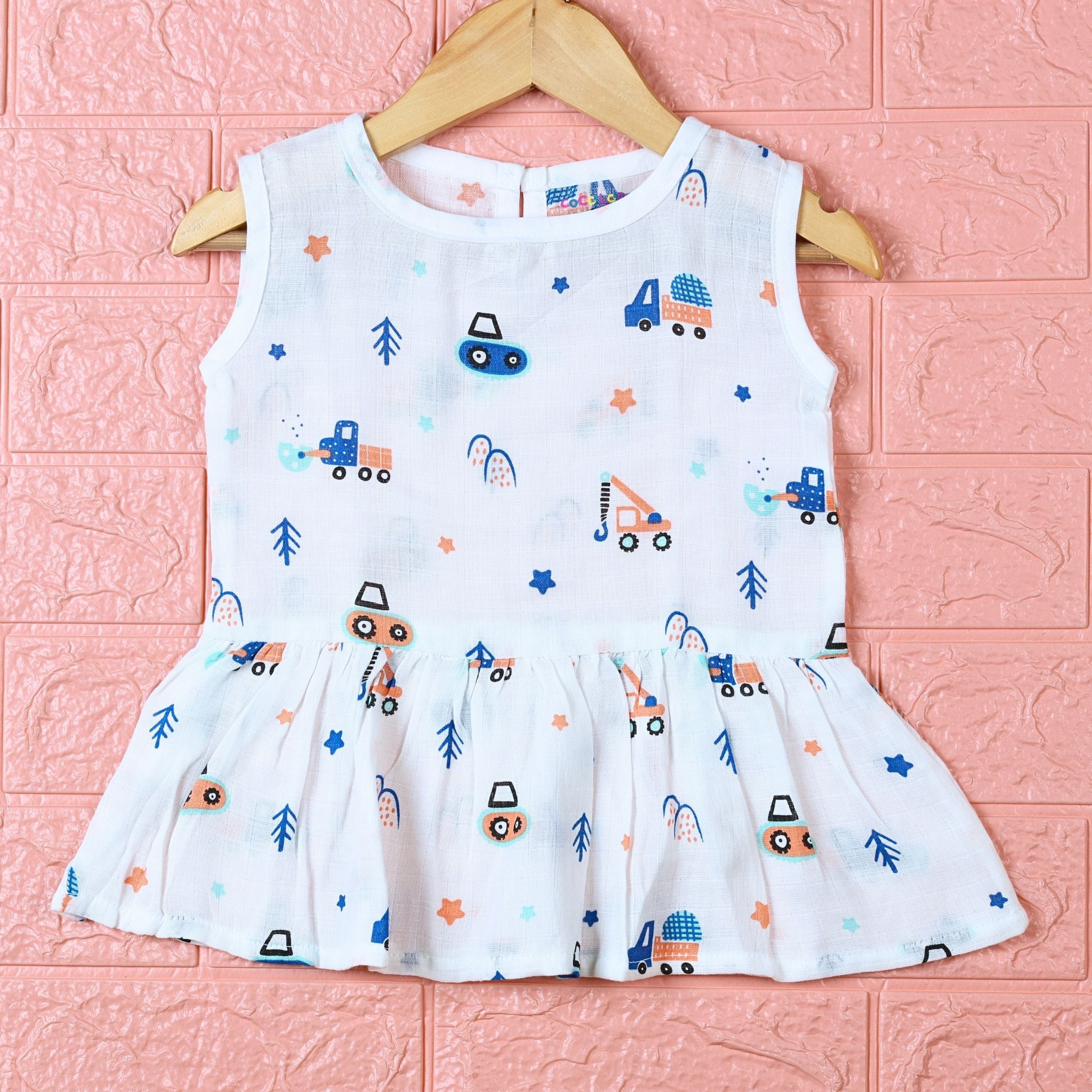 Crane Crew baby sleeveless frock in white with button, printed with construction equipment vehicle pattern