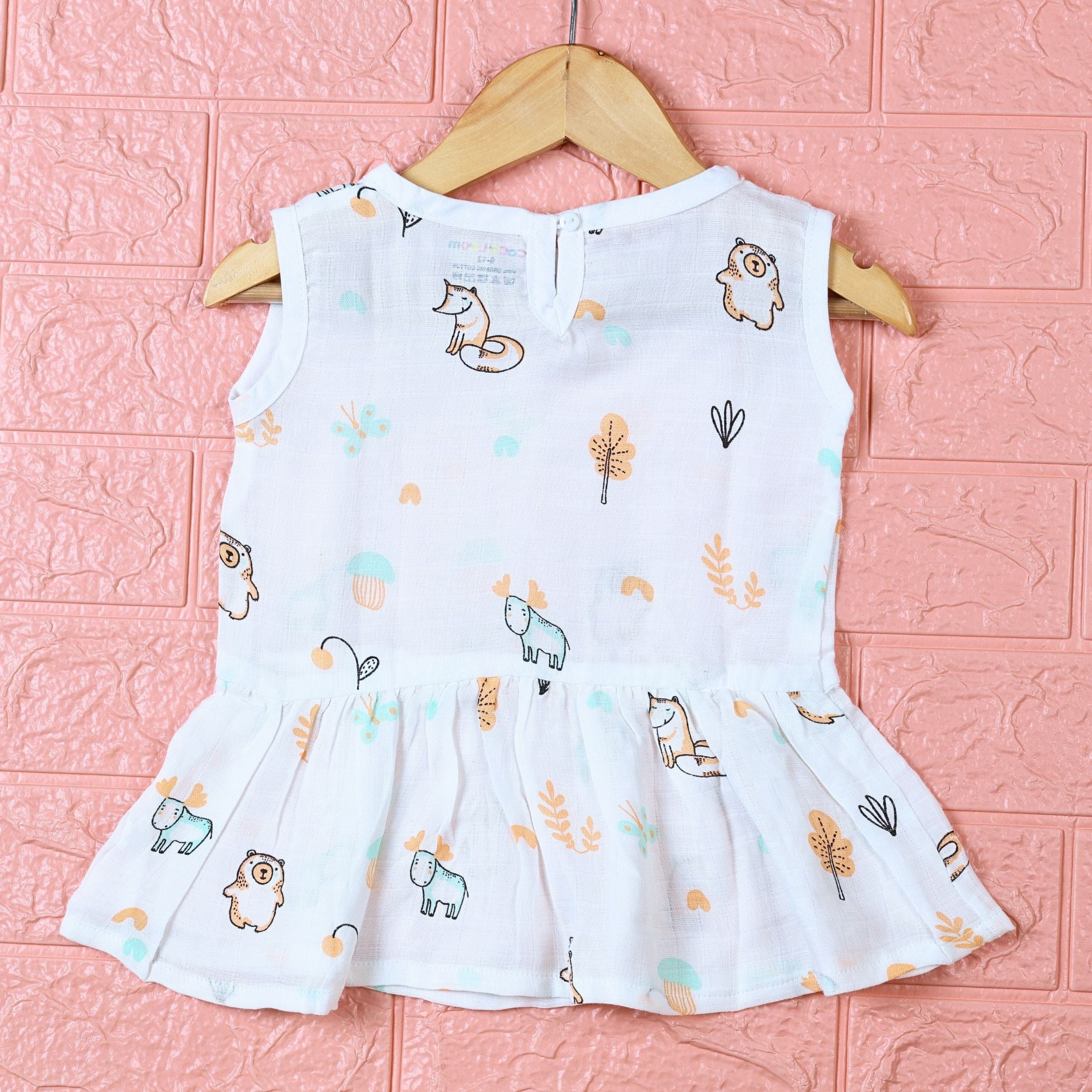 Frosty Forest Baby sleeveless frock in white with button, printed with animal prints