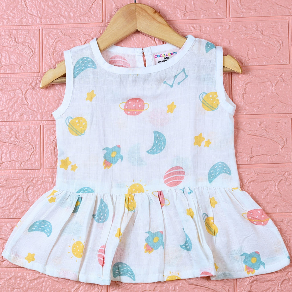 Galaxy Nights baby sleeveless frock in white with button, printed with galaxy themed pattern