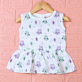 Little Hoots baby sleeveless frock in white with button printed with owl pattern