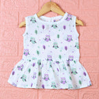 Little Hoots baby sleeveless frock in white with button printed with owl pattern
