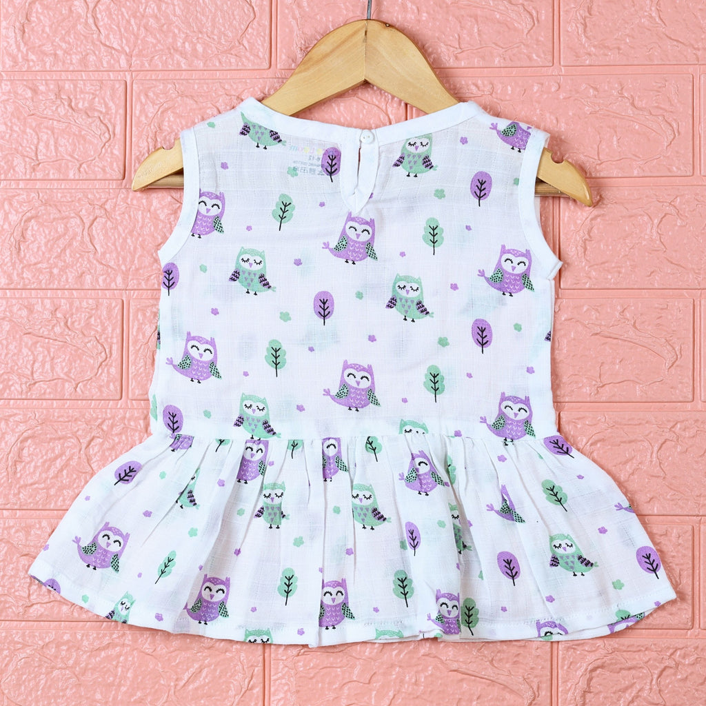 Little Hoots baby sleeveless frock in white with button printed with owl pattern