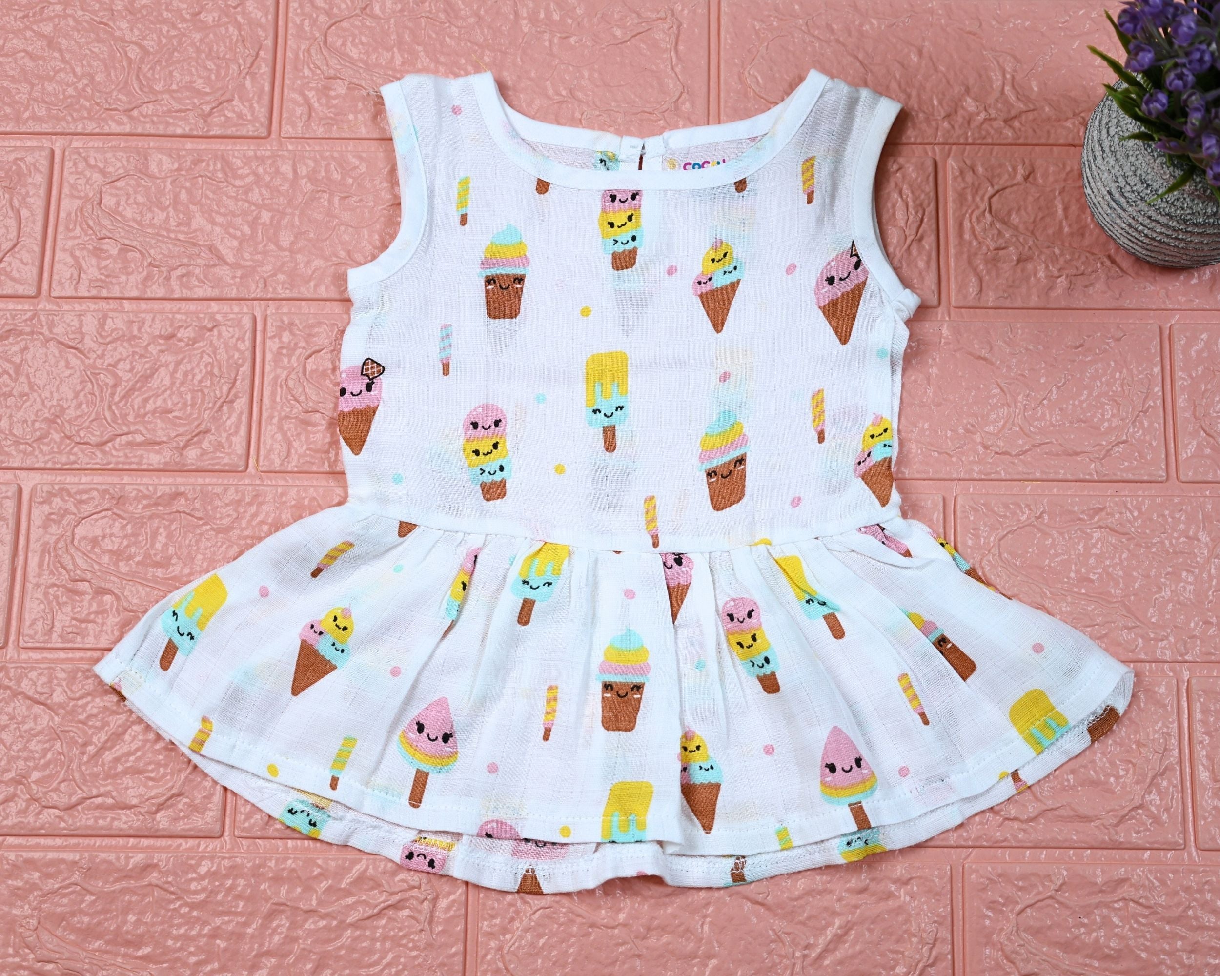Popsicles baby sleeveless frock in white with button, printed with popsicles and ice-cream pattern