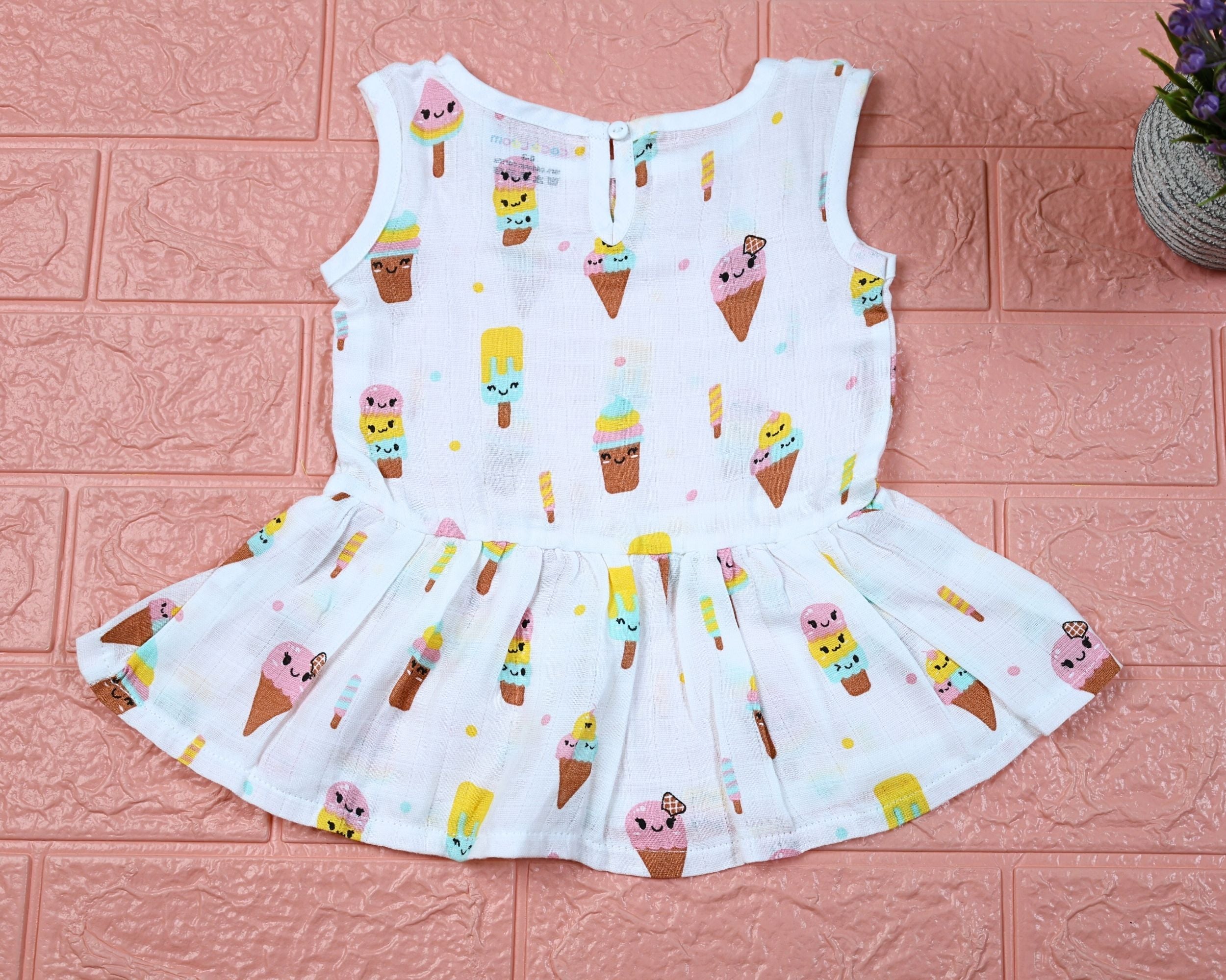 Popsicles baby sleeveless frock in white with button, printed with popsicles and ice-cream pattern