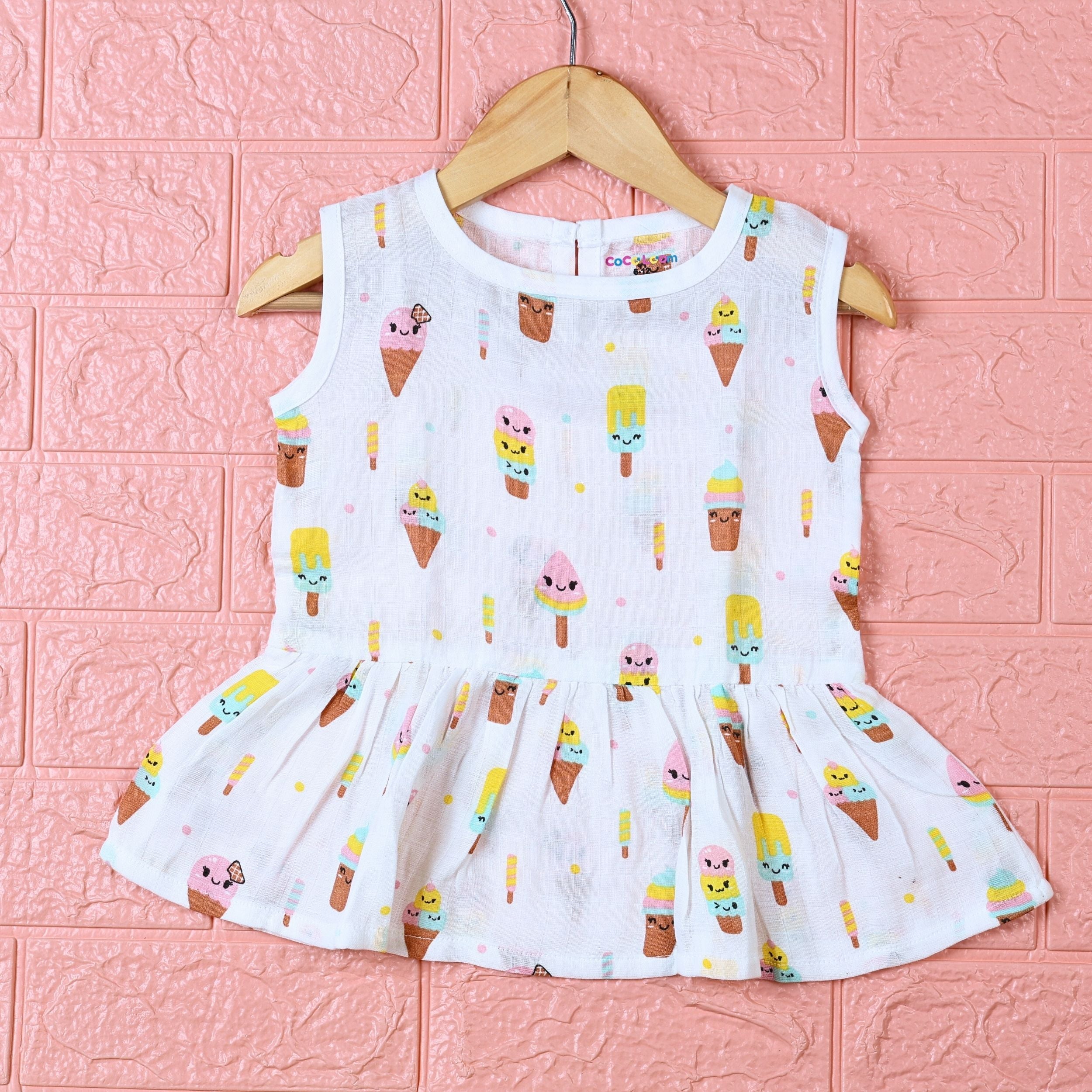 Popsicles baby sleeveless frock in white with button, printed with popsicles and ice-cream pattern