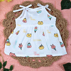 Ice-cream baby frock in white with tie up shoulders, printed with ice-cream pattern