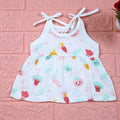 Little Veggies baby sleeveless frock in white with tie up shoulders, printed with colourful veggie patterns