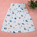 Crane Crew baby sleeveless frock in white with zip, printed with construction equipment vehicle pattern