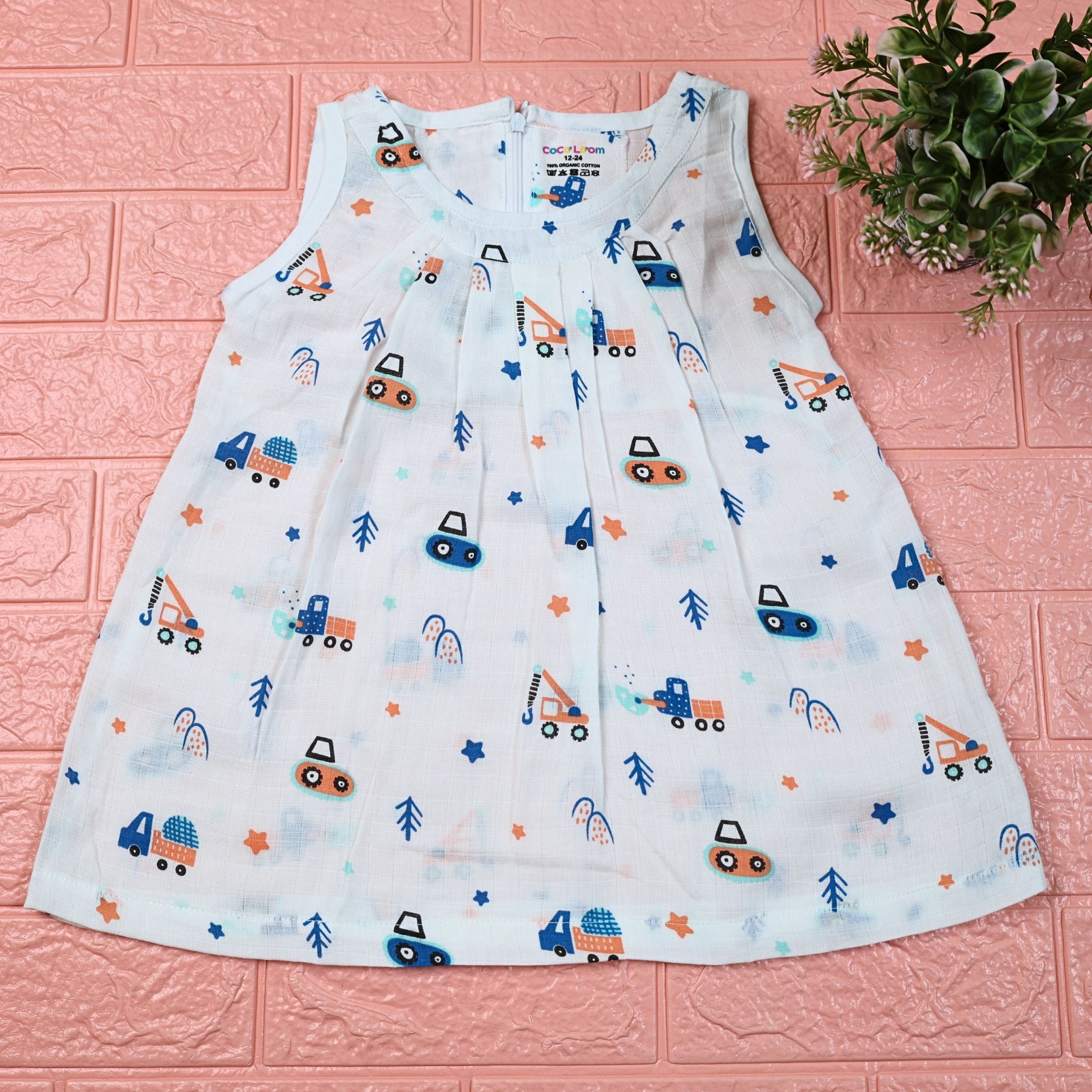 Crane Crew baby sleeveless frock in white with zip, printed with construction equipment vehicle pattern