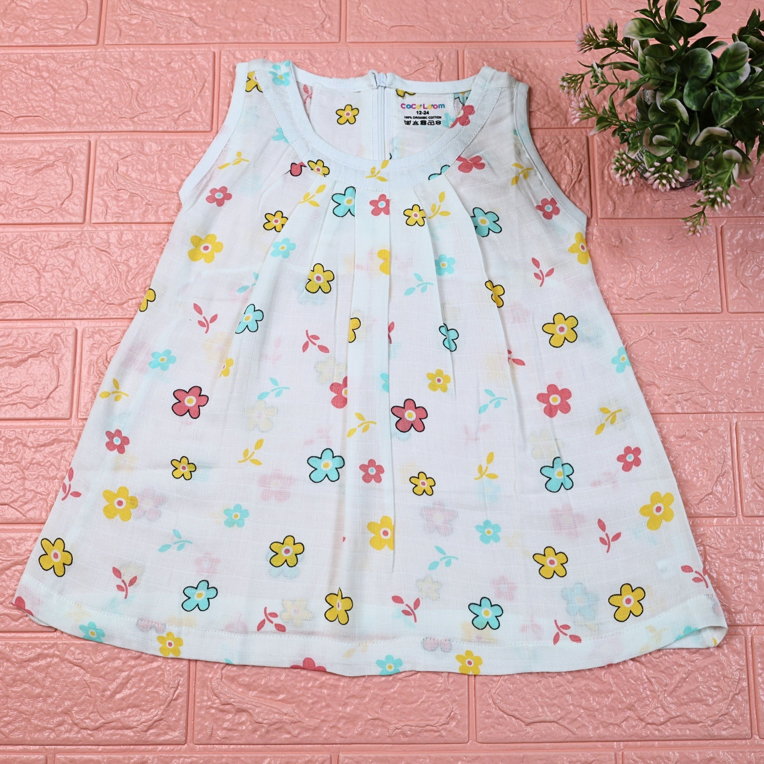 Flora Baby sleeveless frock in white with zip, printed with Floral pattern