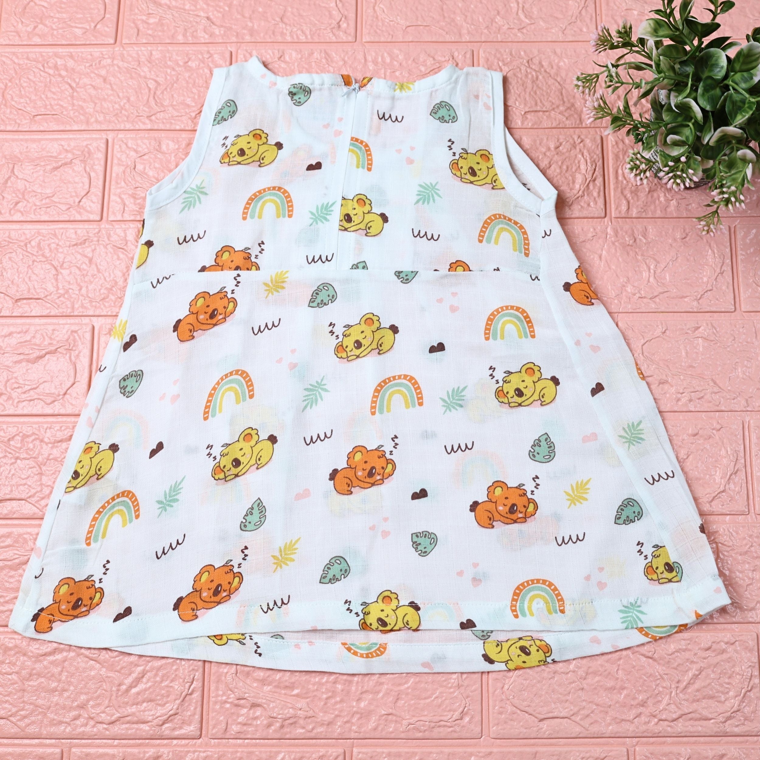 Koala Dreams baby sleeveless frock in white with zip printed with bear and rainbow pattern
