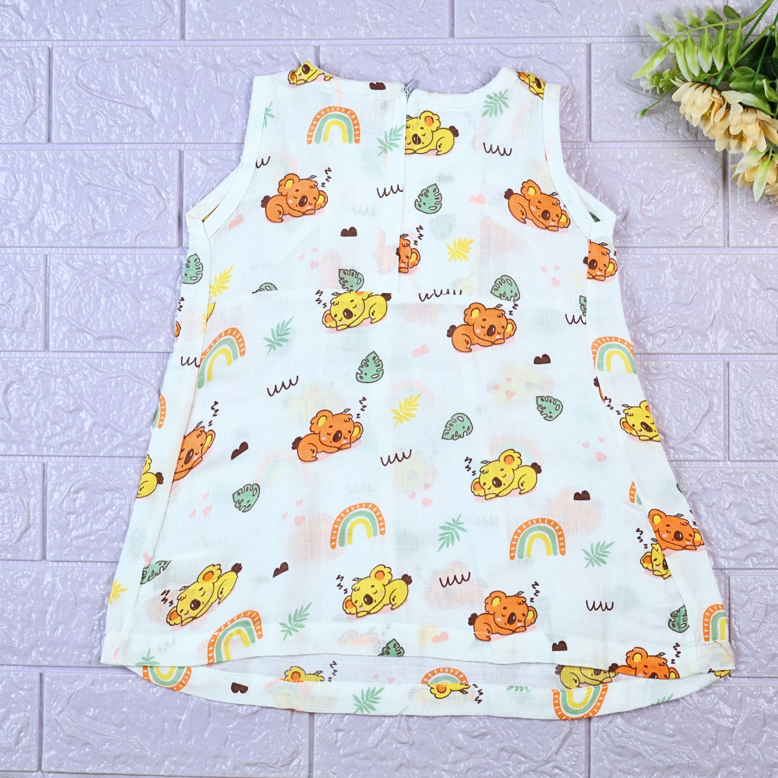 Koala Dreams baby sleeveless frock in white with zip printed with bear and rainbow pattern