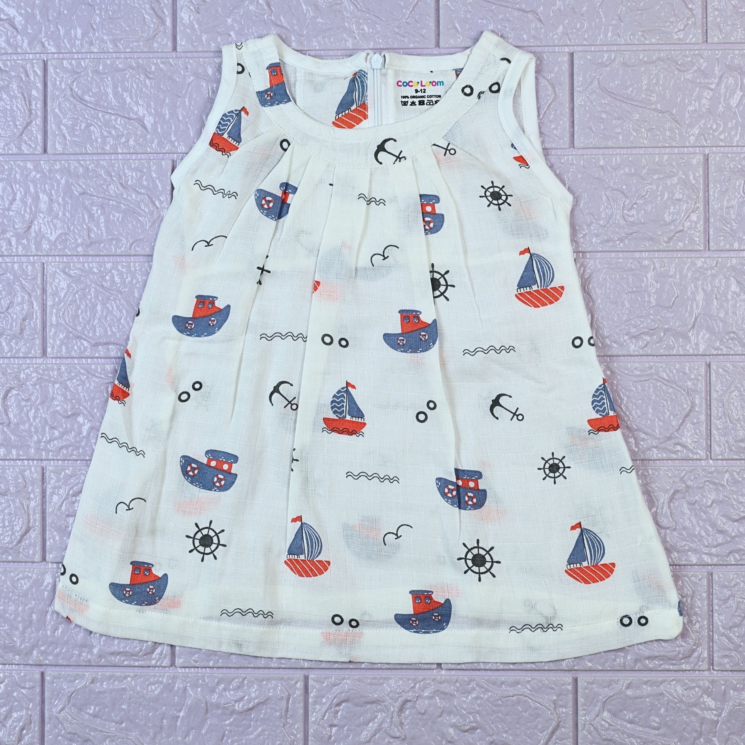 Mini Mariners baby sleeveless frock in white with zip, printed with nautical patterns