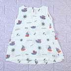 Mini Mariners baby sleeveless frock in white with zip, printed with nautical patterns