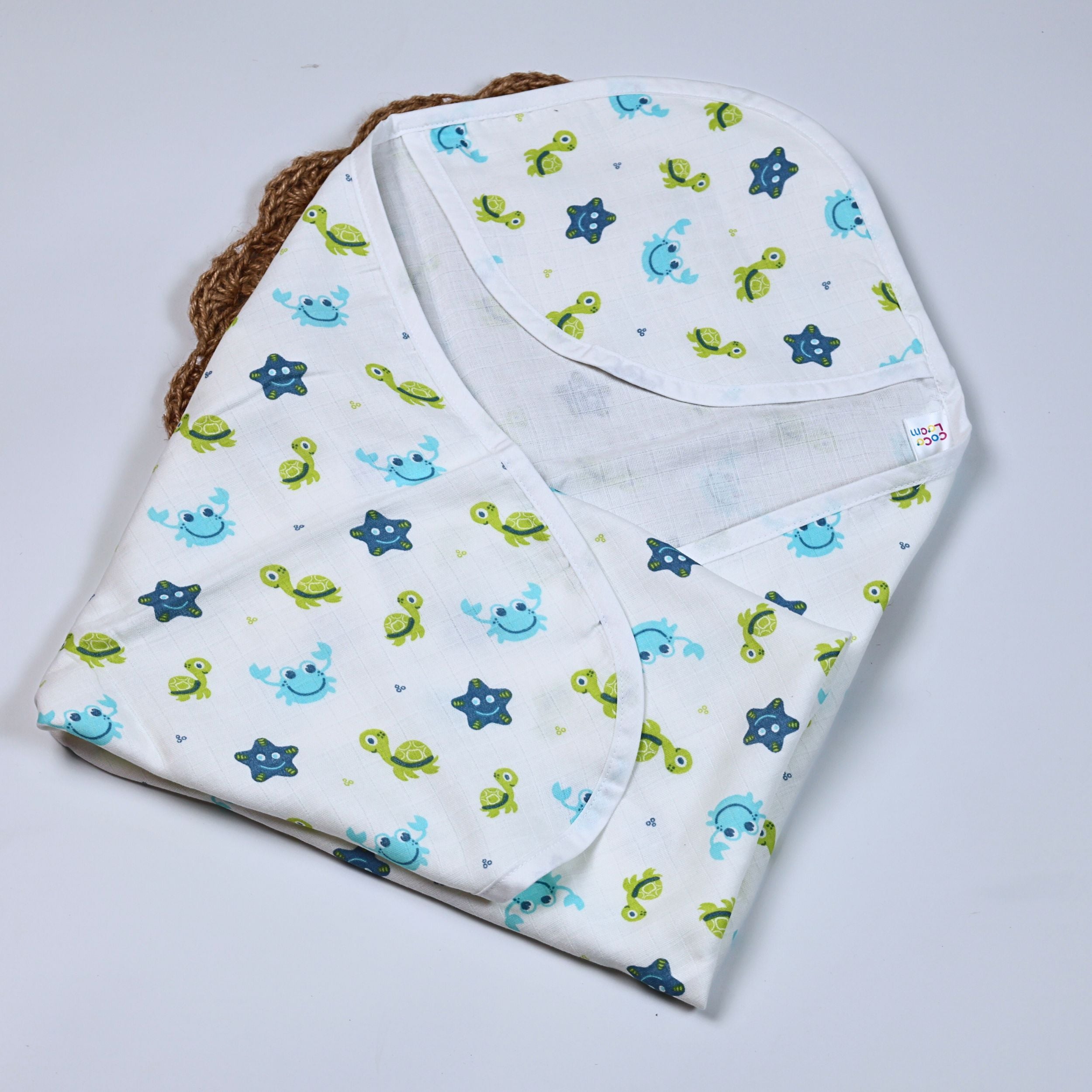 Aqua Babies Baby bath towel in white, printed in light blue aquatic life