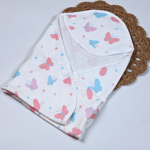 Butterfly Blush baby hooded towel
 in white printed with pastel butterfly motifs in soft pink and blue tones.
