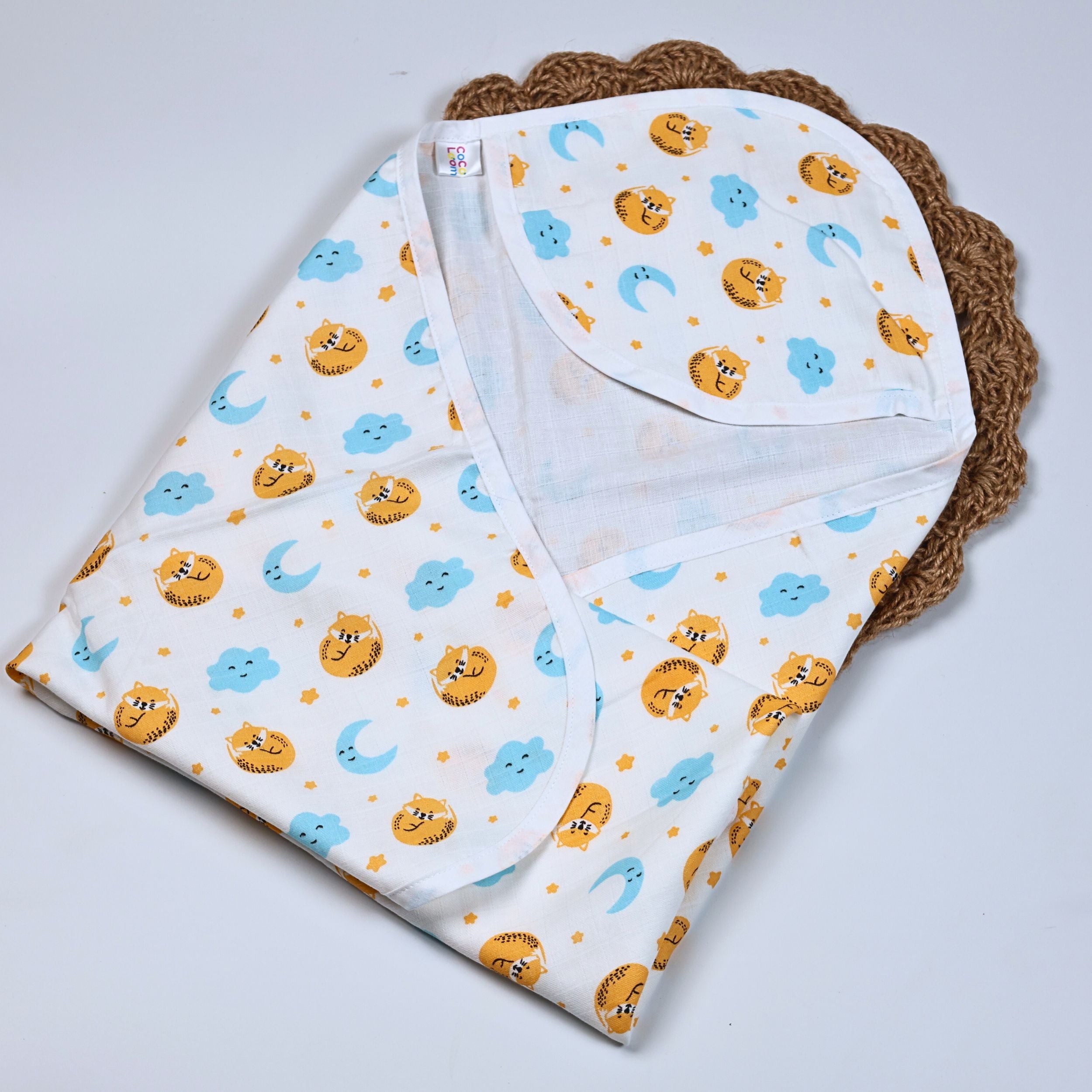 Dreamy Cubs baby hooded towel in white, printed with cartoon designs