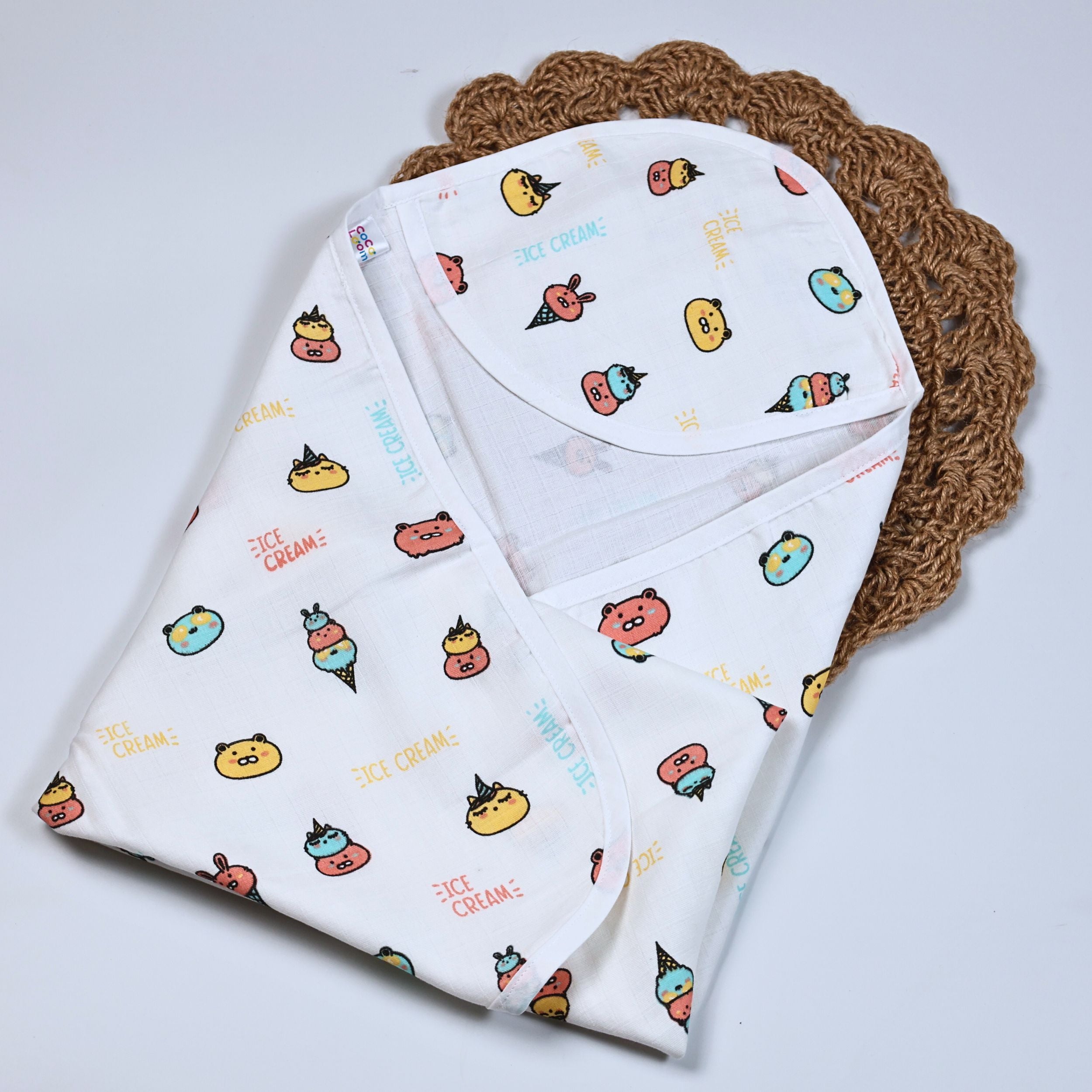 Ice-cream baby hooded towel in white, printed with ice-cream pattern