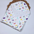Purple Magic baby hooded towel in white, printed with colourful patterns