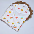 Safari Snuggles Baby hooded towel in white, printed with colorful jungle animal prints