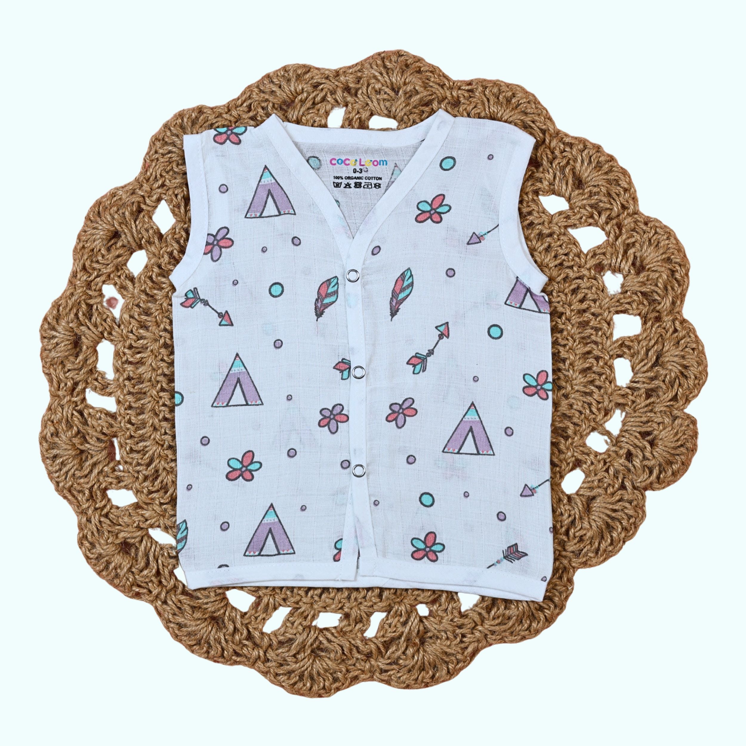 Boho Bloom Baby sleeveless top in white snap buttons printed with colorful pattern