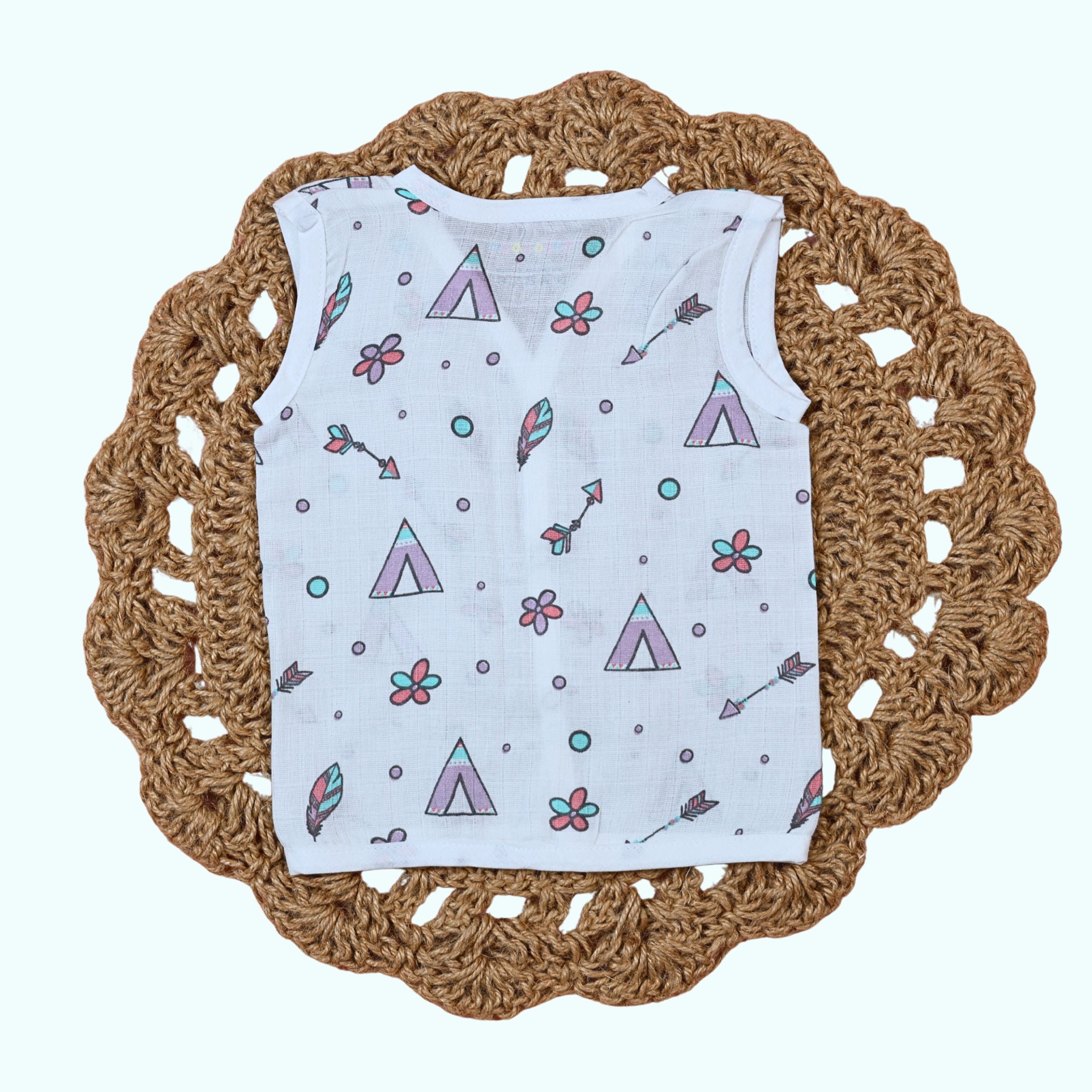 Boho Bloom Baby sleeveless top in white snap buttons printed with colorful pattern