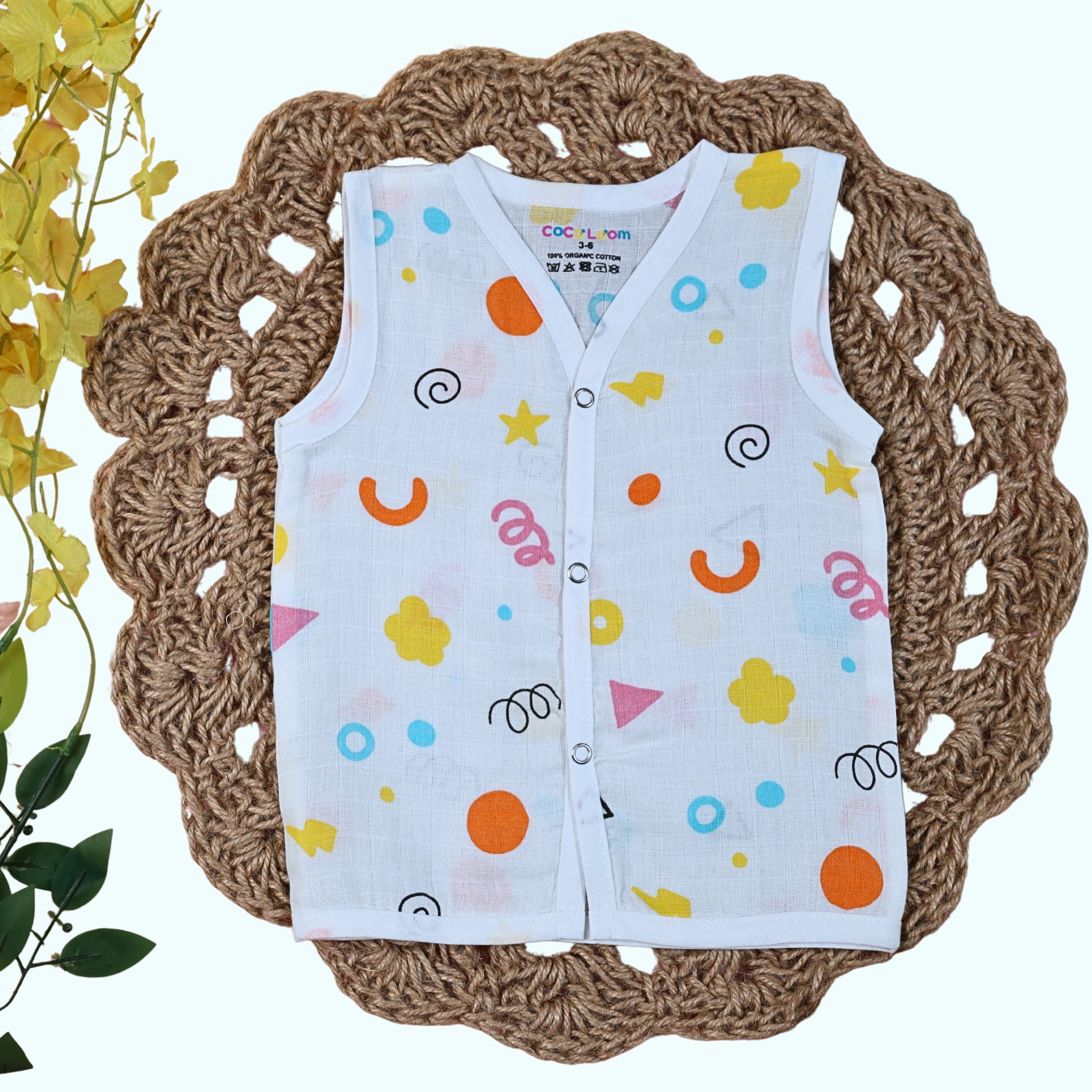 Colour Pops Baby sleeveless top in white with snap buttons printed with colorful patterns