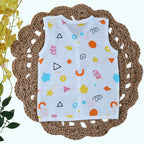 Colour Pops Baby sleeveless top in white with snap buttons printed with colorful patterns