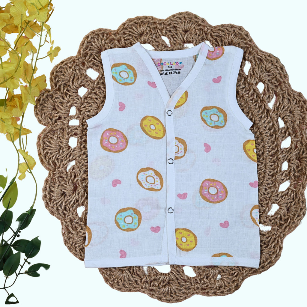 Donuts Baby sleeveless white top with snap buttons printed with donut pattern