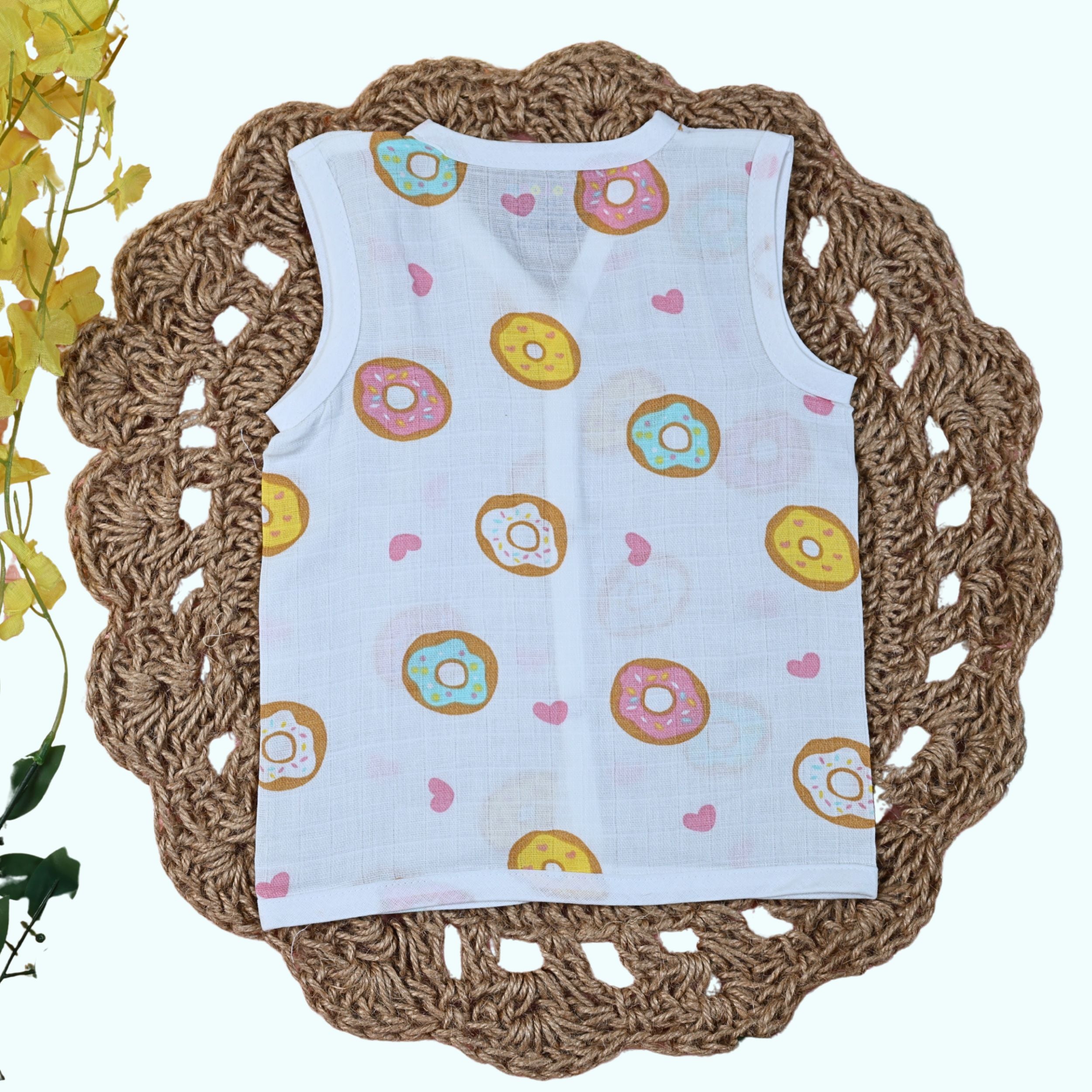 Donuts Baby sleeveless white top with snap buttons printed with donut pattern