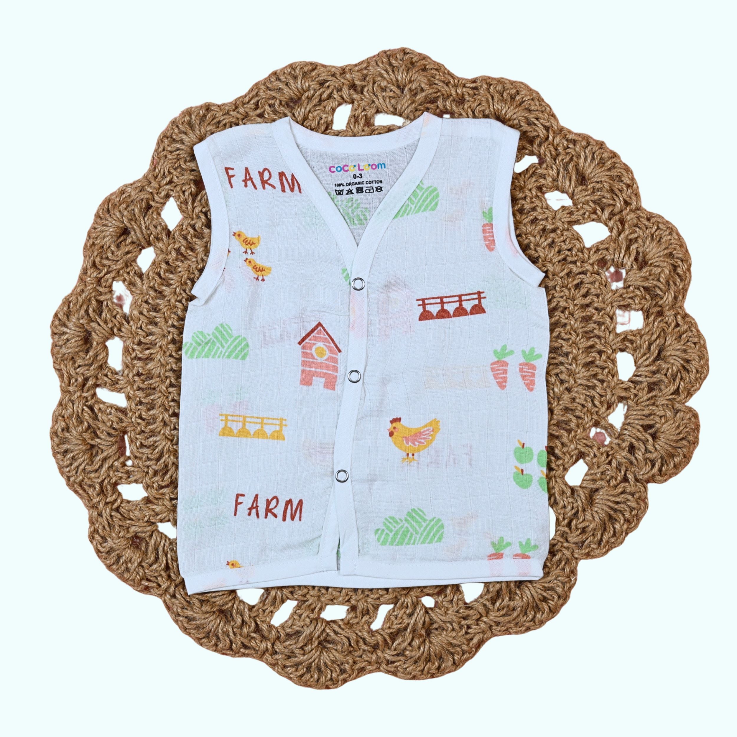 Farm Tales Baby sleeveless top in white with snap buttons printed with farm-themed pattern