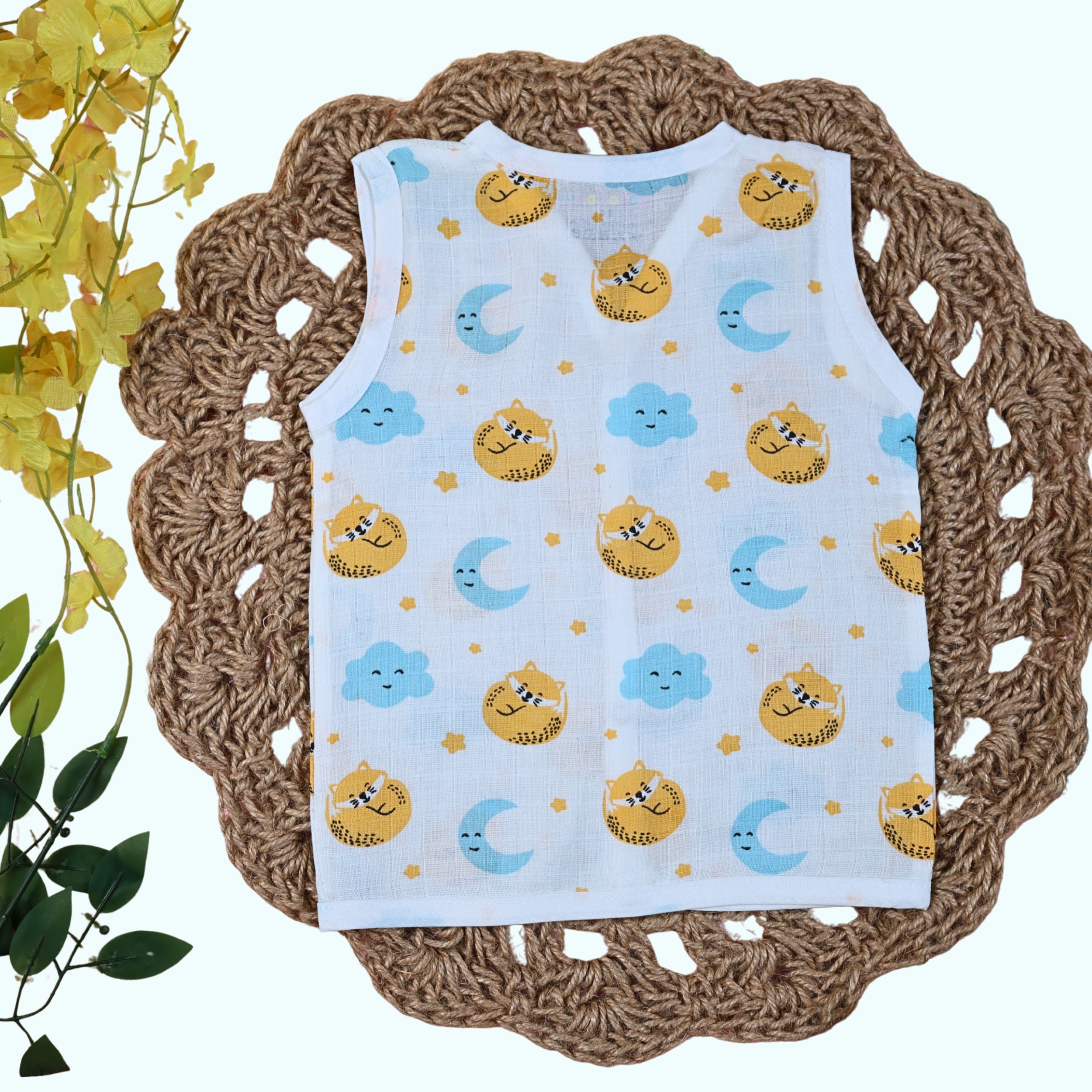 Dreamy Cubs baby sleeveless top in white with snap buttons printed with cartoon designs