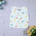 Rainbow Rides baby sleeveless top in white with snap buttons, printed with rainbows, air balloons, clouds, and stars.