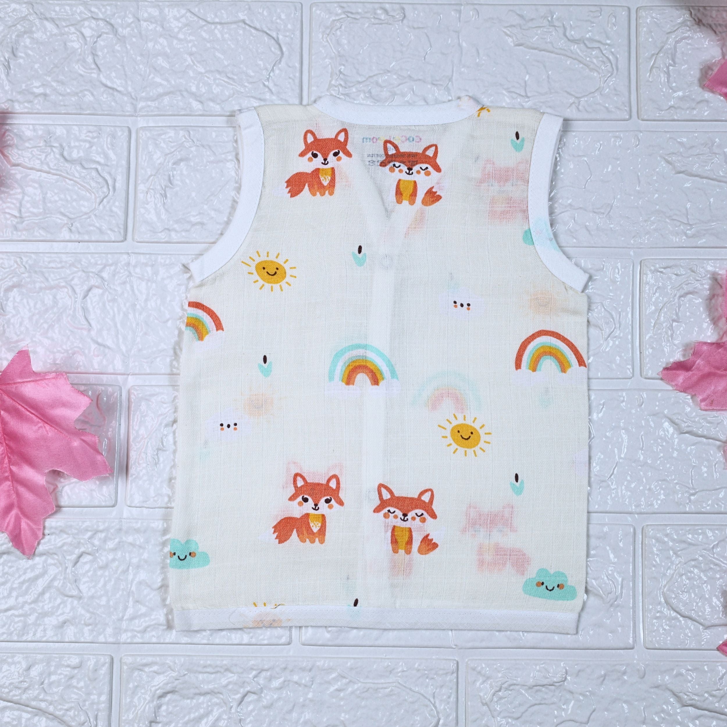 Foxie baby sleeveless top in off white yellow colour with snap buttons printed with fox and rainbow pattern