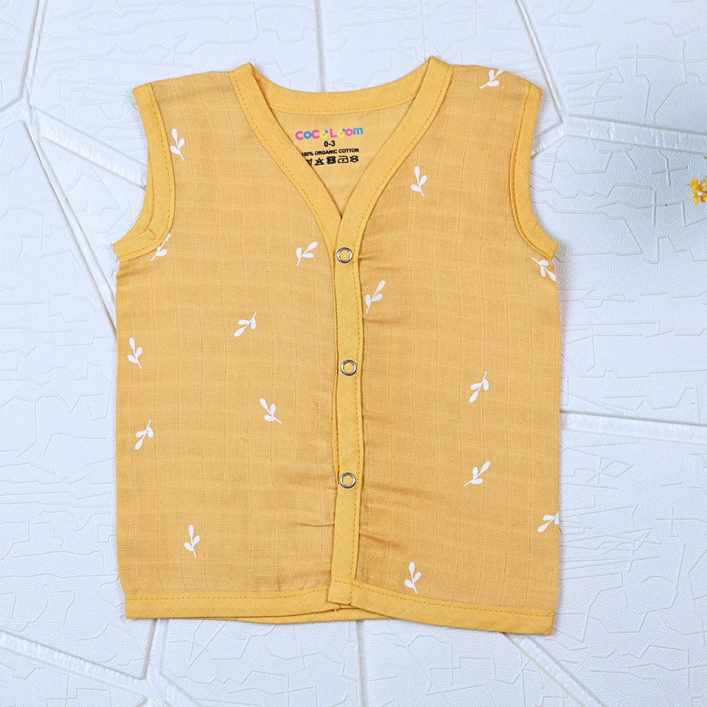 Mustard Sprigs baby sleeveless top in yellow with snap buttons printed with white floral patterns 