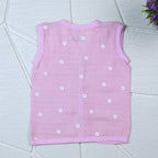 Pink Daisy baby sleeveless top in pink with snap buttons printed with white floral patterns