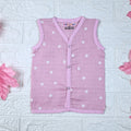 Pink Daisy baby top in pink with snap buttons printed with white floral patterns