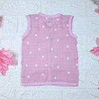 Pink Daisy baby top in pink with snap buttons printed with white floral patterns