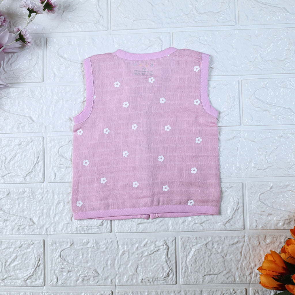 Pink Daisy baby sleeveless top in pink with snap buttons printed with white floral patterns