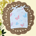 Butterfly Blush baby top in white tie up shoulders, printed with colourful butterfly pattern 