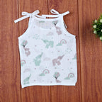 Tiny Tusks baby top in white with shoulder knots, with elephant, clouds and rainbow
 prints in gentle green and brown
 shades.