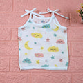 Twinkle Sky baby top in white with tie-up shoulders, printed with pastel cloud, stars and moon.