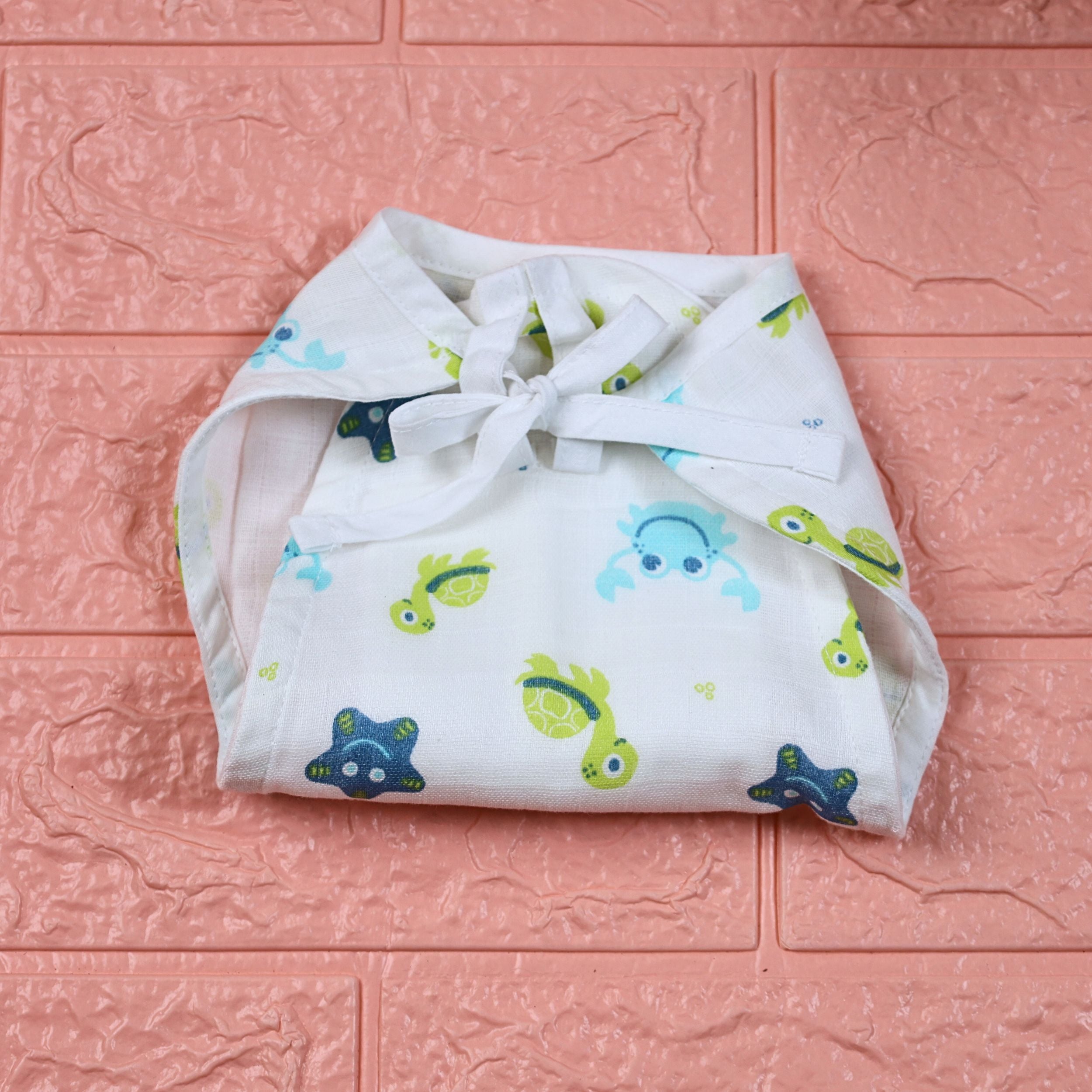 Aqua Babies Baby nappy in white with tie up knot print in light blue aquatic life