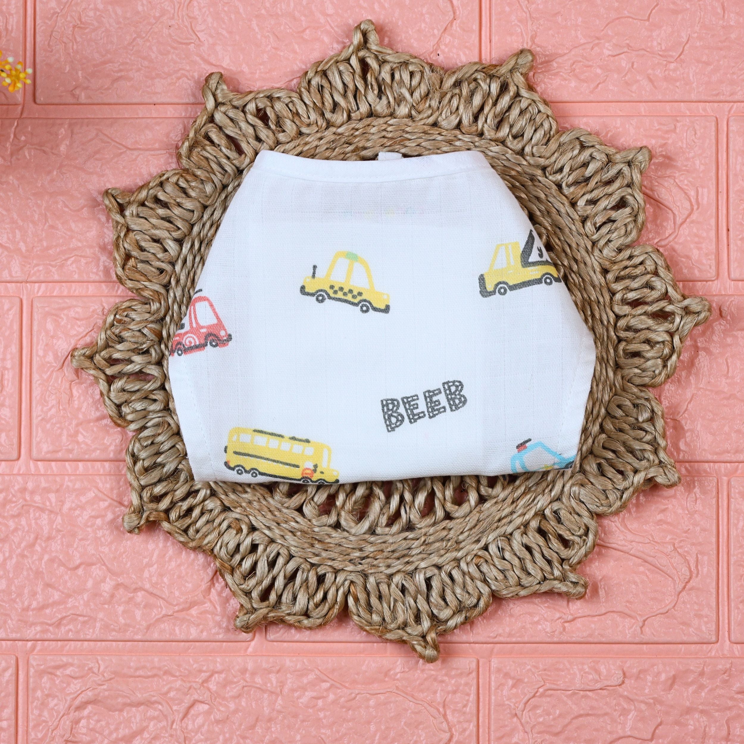 Beed Rides Baby Nappy in white with tie up knots, printed with vehicle patterns