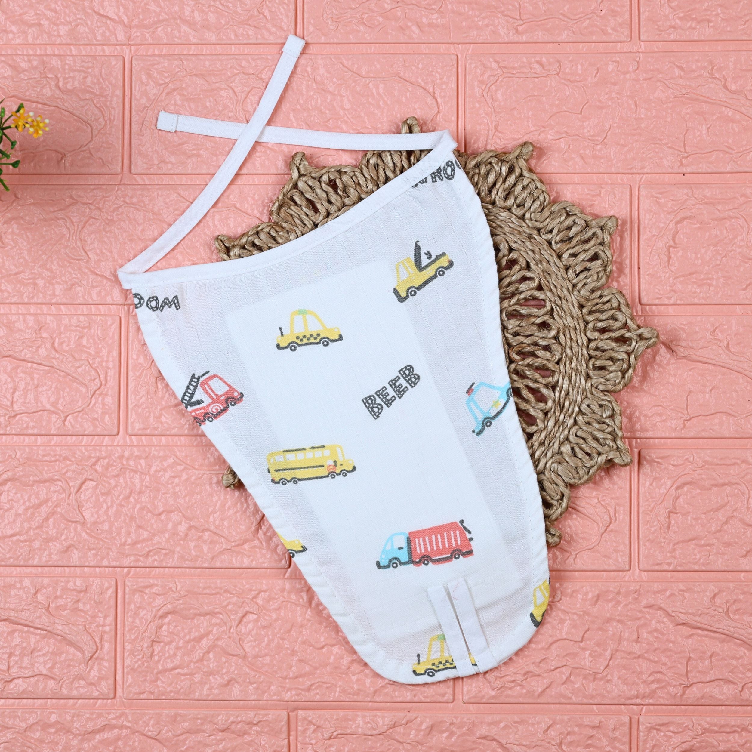 Beed Rides Baby Nappy in white with tie up knots, printed with vehicle patterns