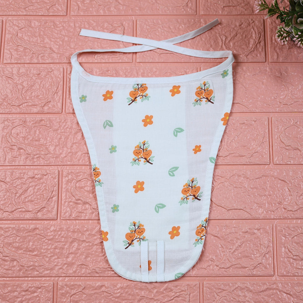 Citrus Bloom Baby nappy in white with tie up knot, printed with orange floral patterns