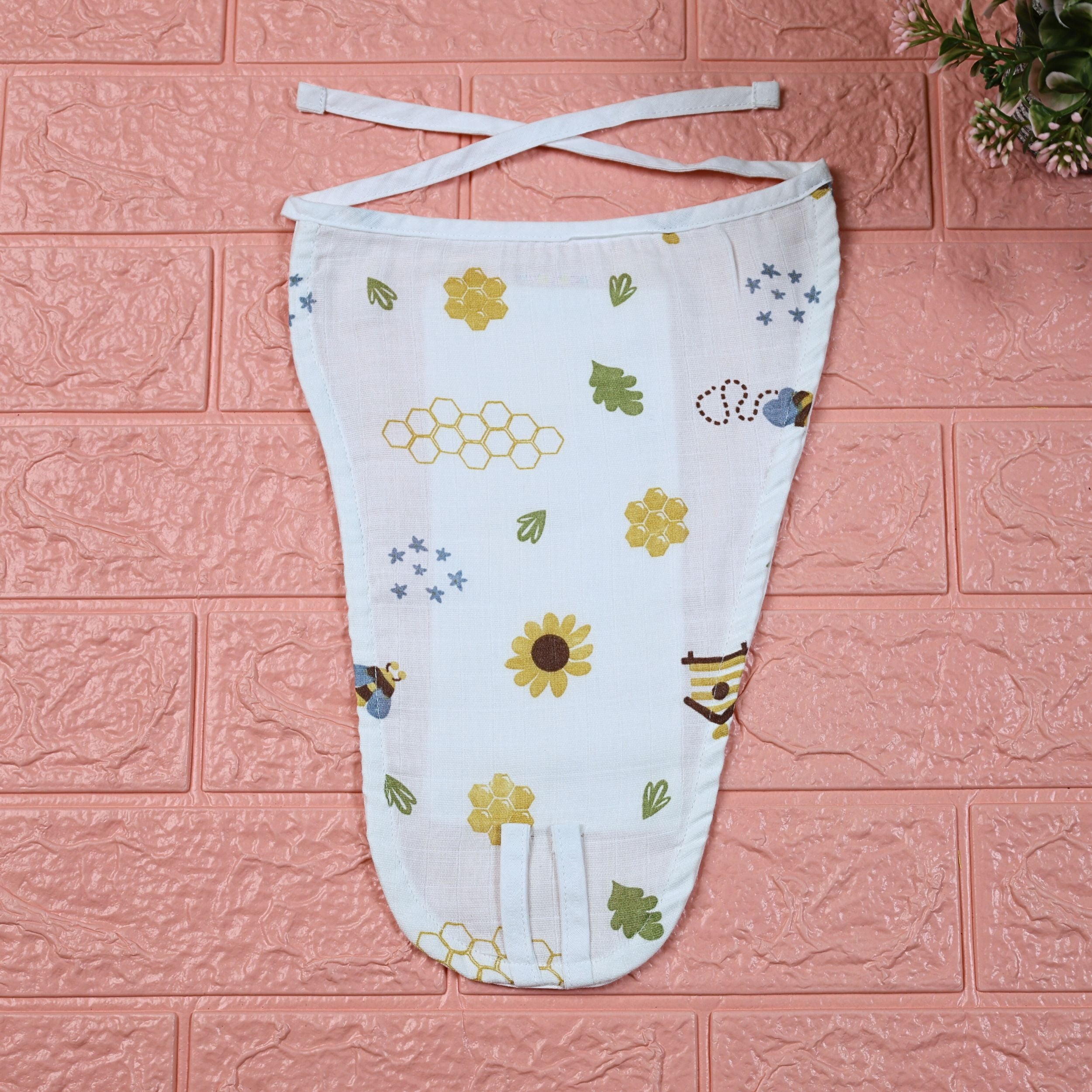 Honey Bloom Baby nappy in white with tie up knot printed with floral and bee pattern