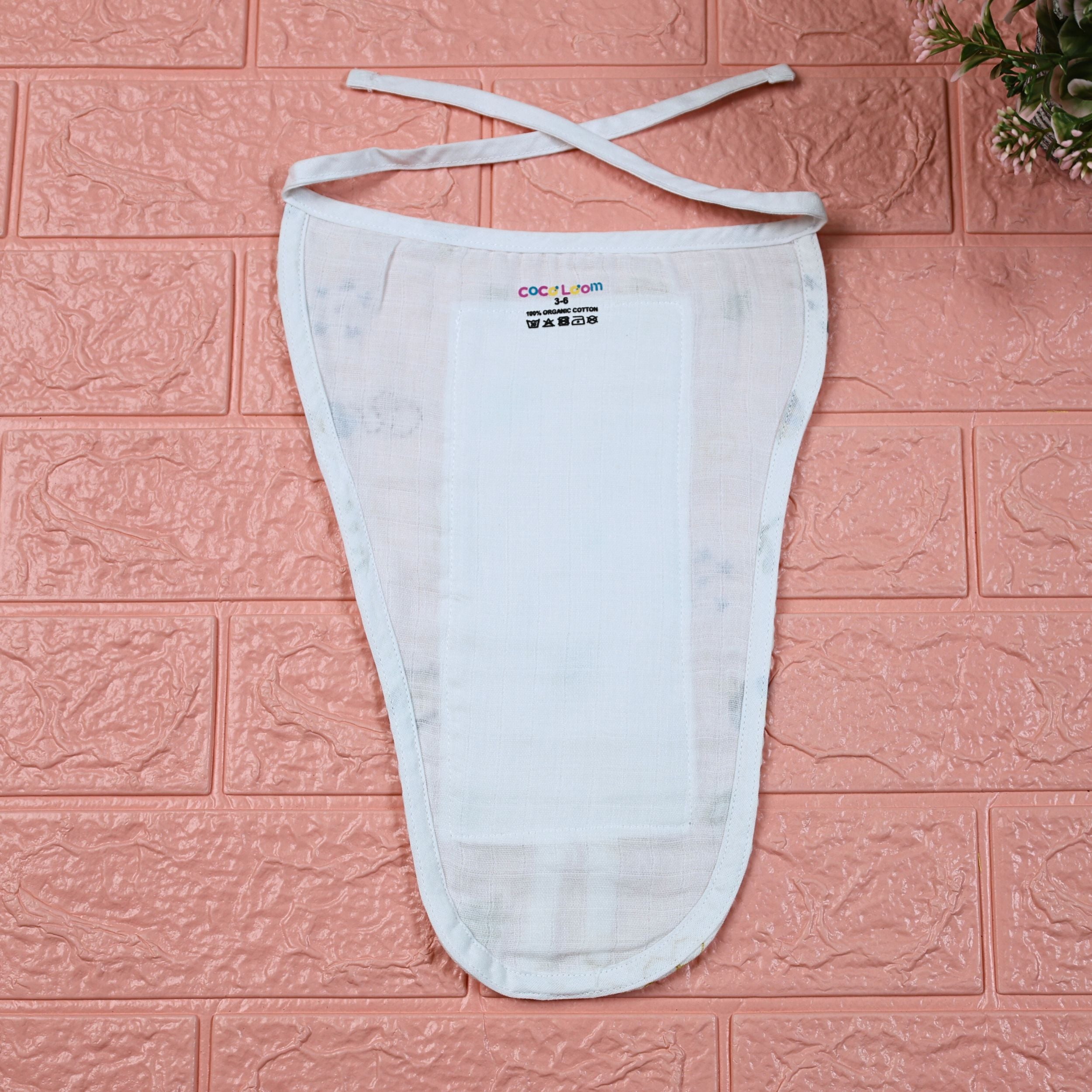 Honey Bloom Baby nappy in white with tie up knot printed with floral and bee pattern